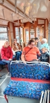 Skupina členů v historické tramvaji v roli cestujících Skupina členů v historické tramvaji v roli cestujících